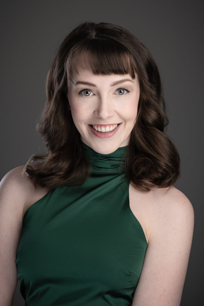 Adelaide Actor Delanie Whibley in a green dress