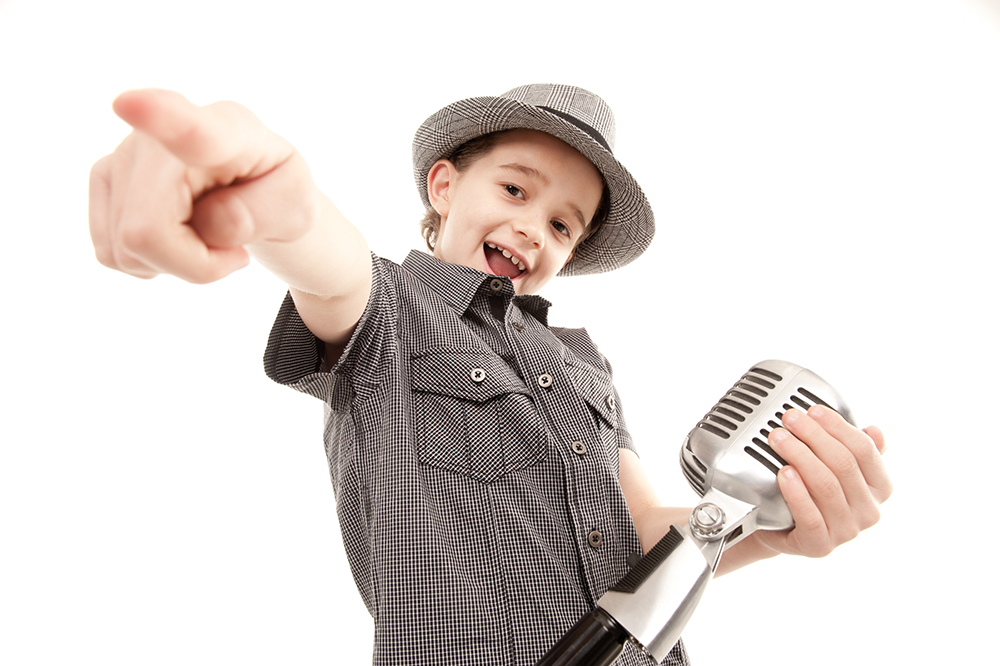 Kid with vintage microphone